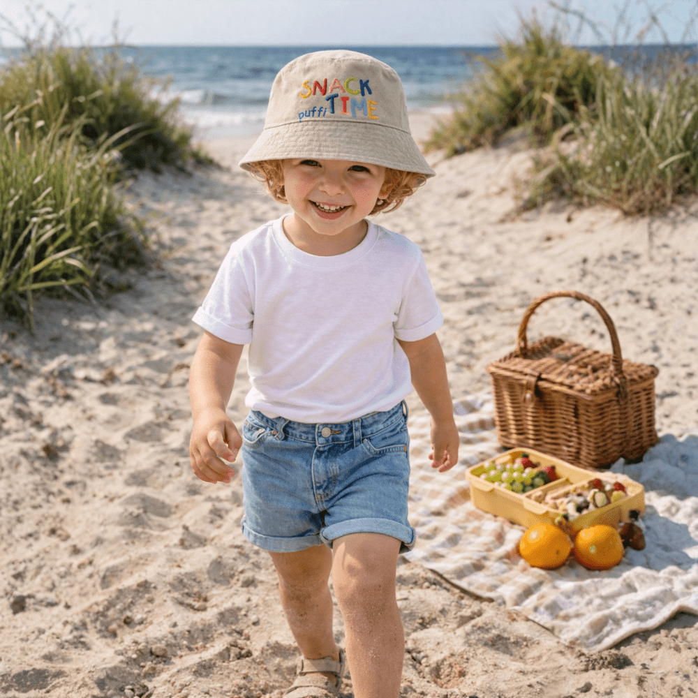 Puffi otroška bucket kapa Snack Time – UPF50+ zaščita | bež - PUFFI